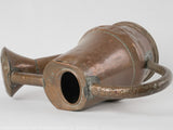 Timeless, antique copper watering can