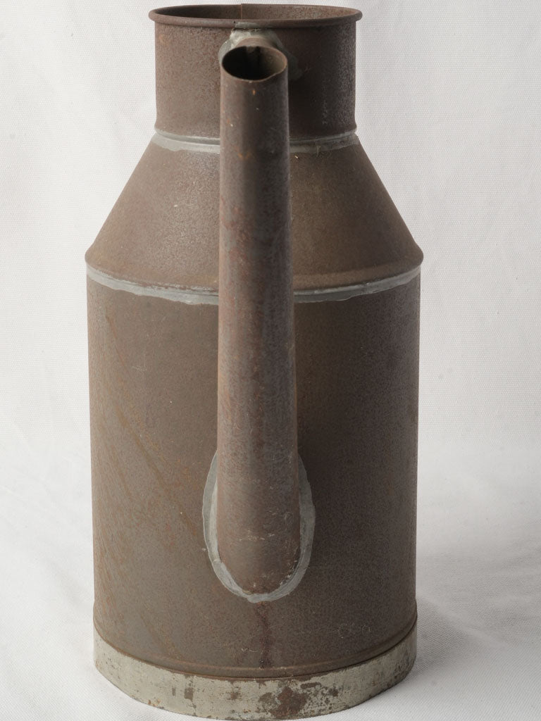 Oxidized early 20th-century watering can  