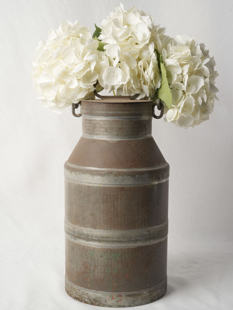 Rustic vintage farmhouse milk churn