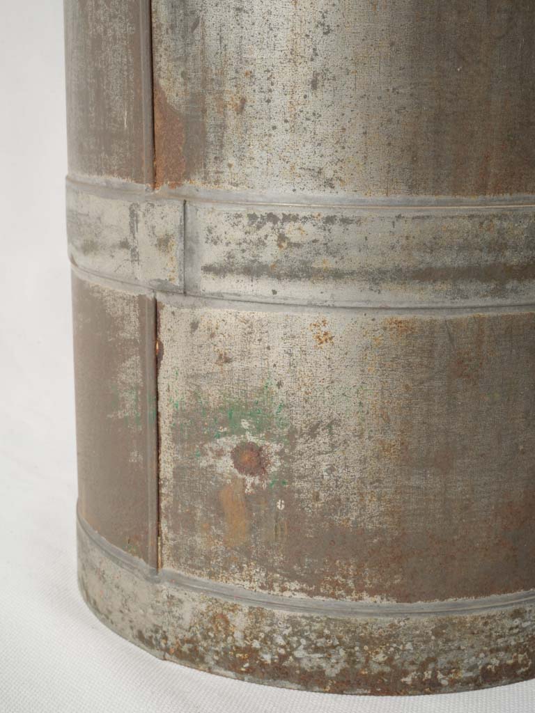 Stiff-lidded antique milk churn