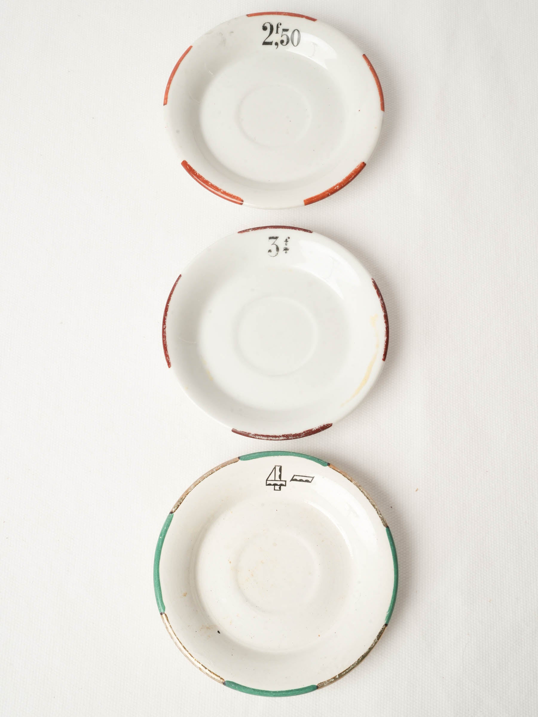 Three Vintage French Bistro Porcelain Saucers 5"