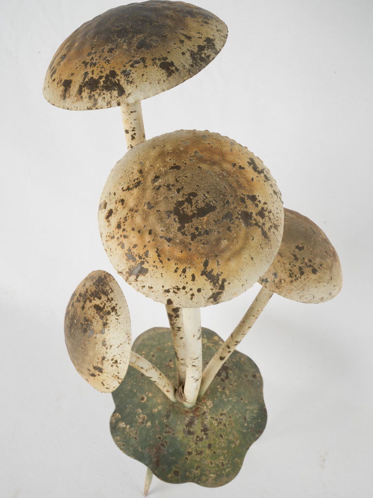 Antique metal garden mushroom sculpture