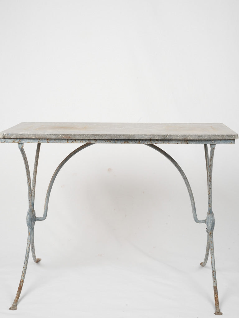 Time-worn antique indoor bistro table