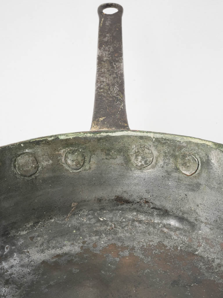 Well-worn antique cooking pot