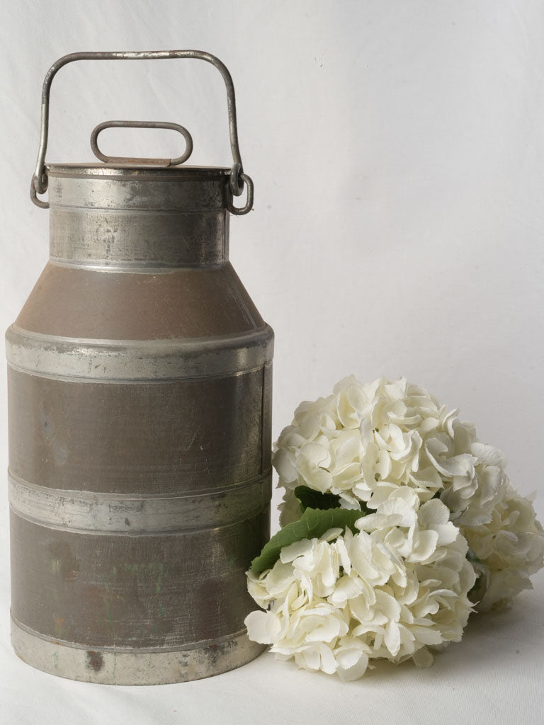 Vintage farmhouse-style milk churn