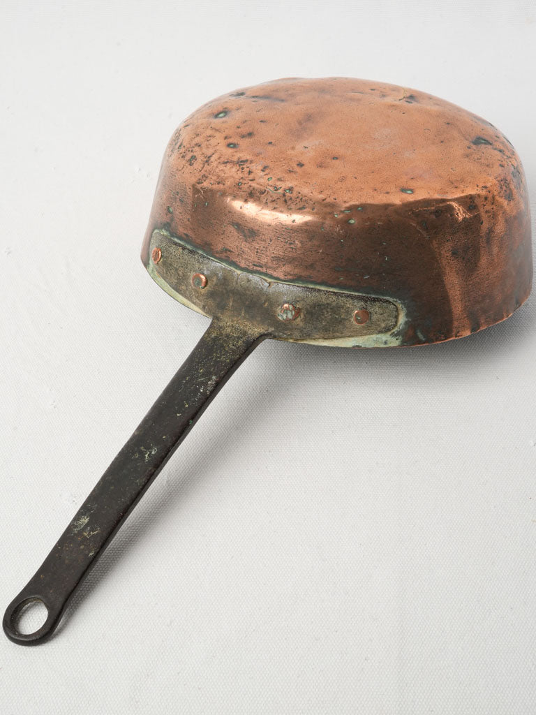Charming rustic copper skillet