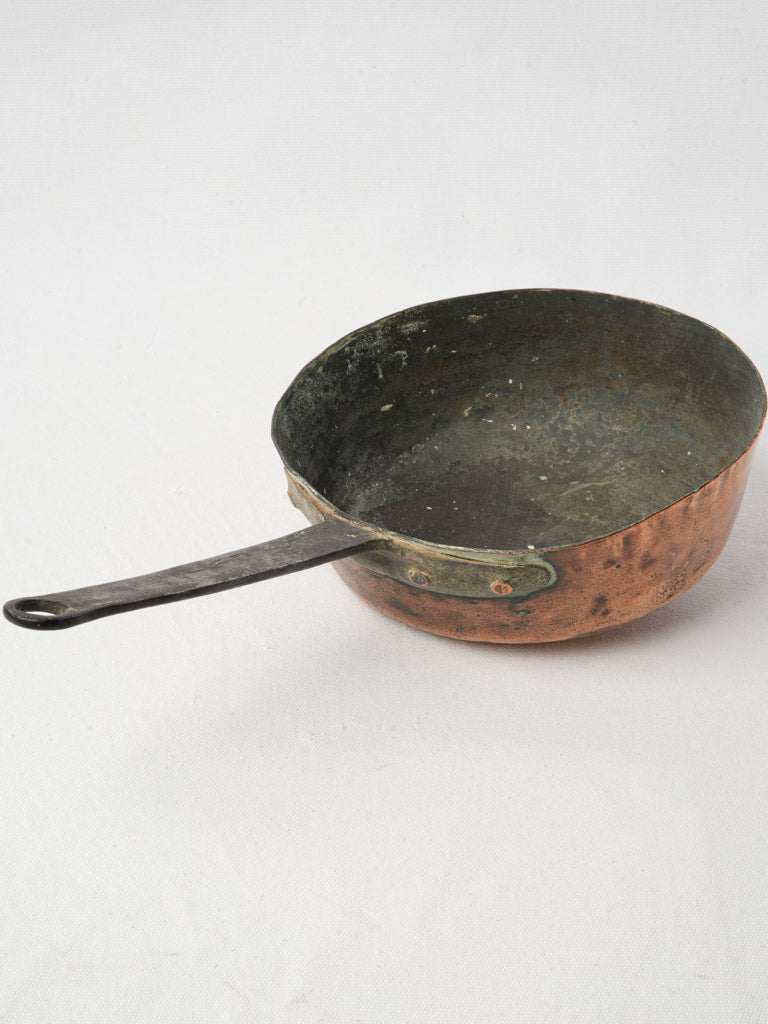 Timeworn artisan copper utensil