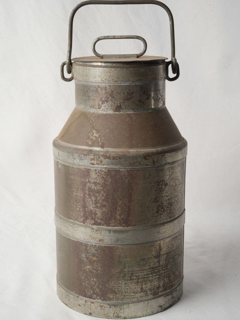 Classic weathered farmhouse milk churn