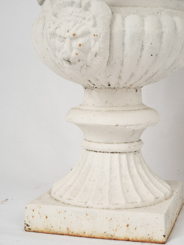 Shabby-chic white Medici garden urns