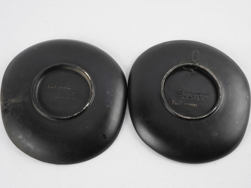3 freeform black plates w/ still life - Giraud Vallauris - 10¾"