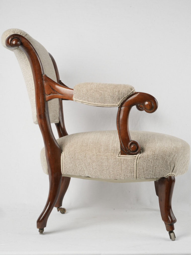 Textured off-white upholstered armchair