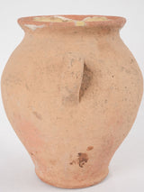 Time-worn glazeless ceramic jar