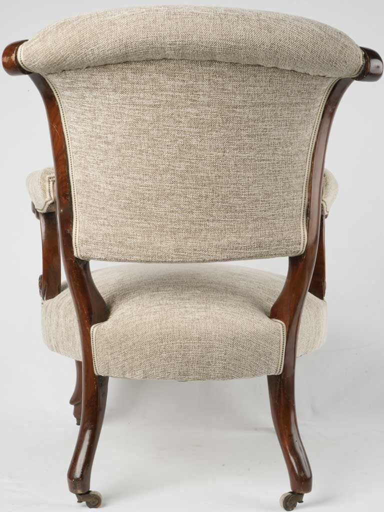 Petite mahogany armchair