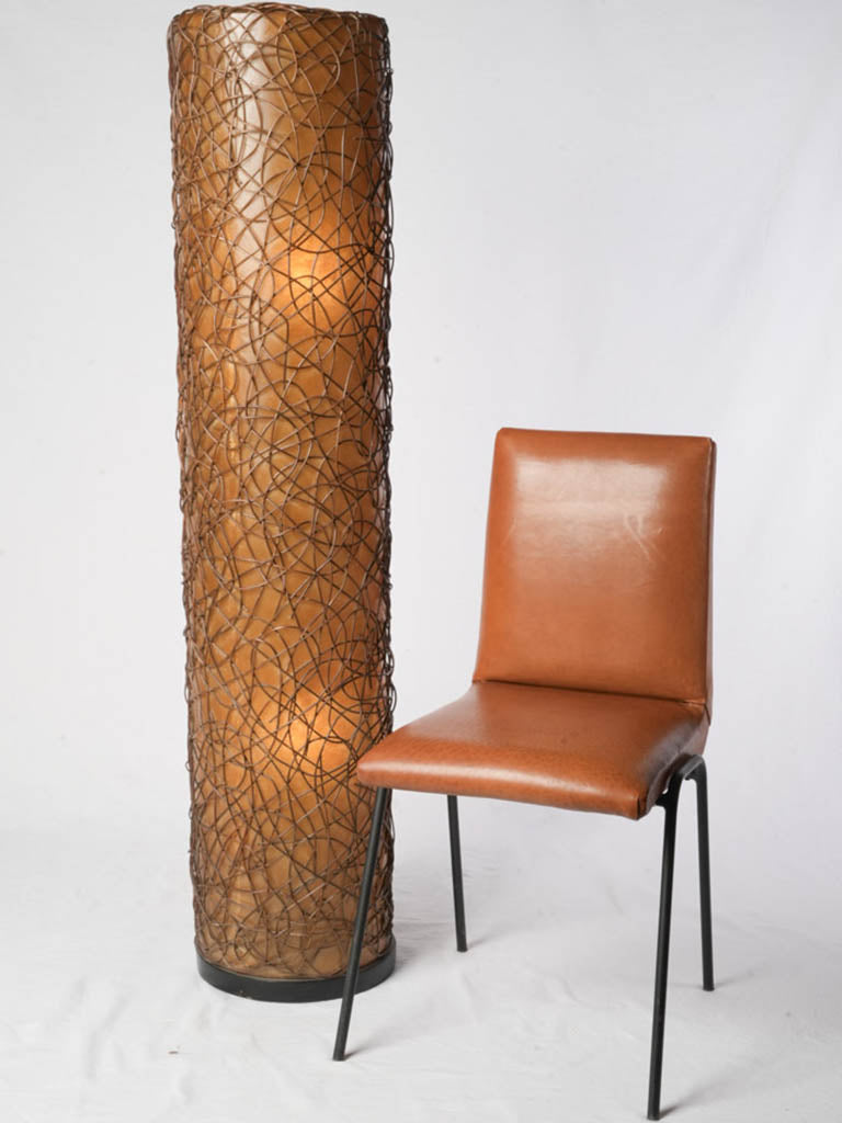 Sculptural artisanal rattan light source  