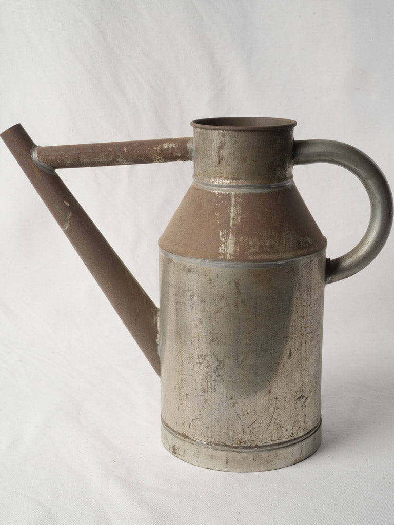 Patinaed French winemaking watering can  