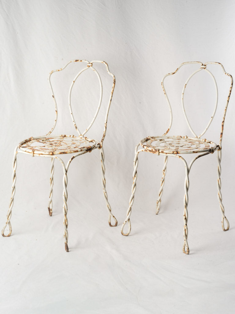 Pair of late 19th century French wrought iron garden chairs