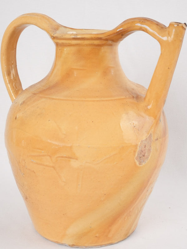 Antique ocher-glazed French water cruche