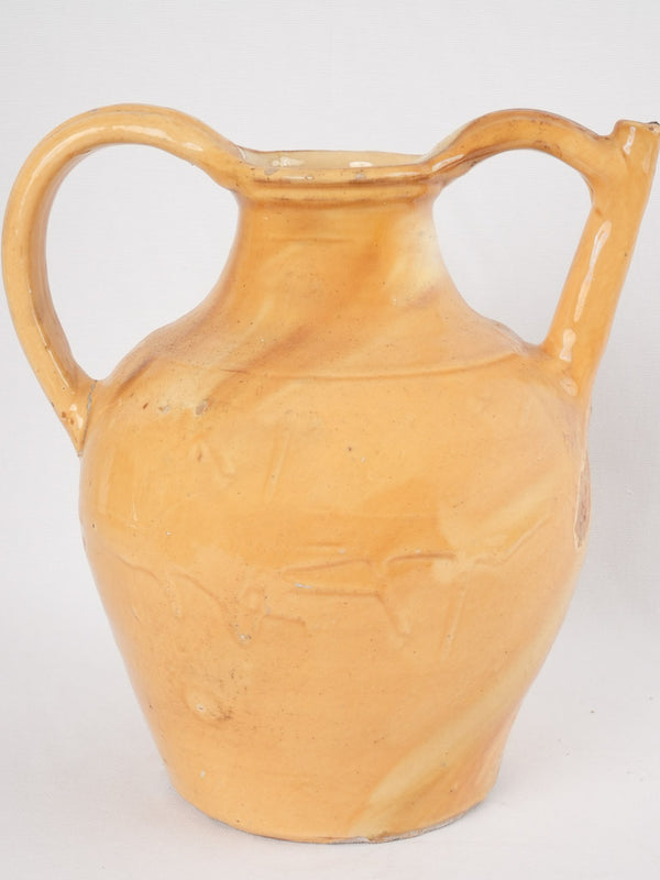 Aged yellow ewer from nineteenth century