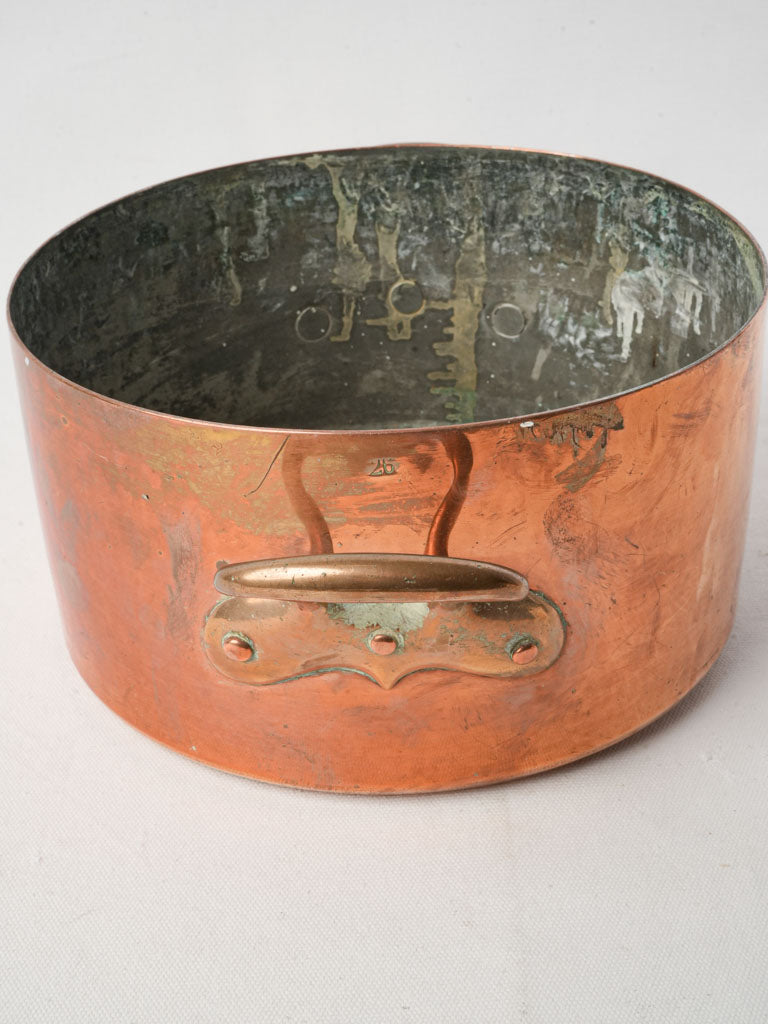 Rustic copper stew vessel