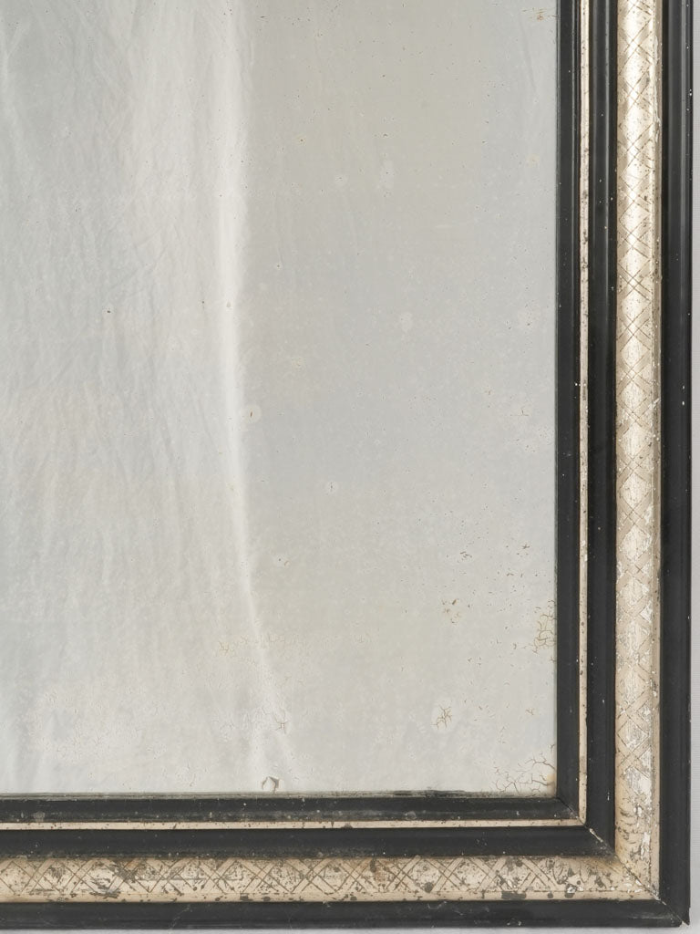 Timeless black-accented antique mirror