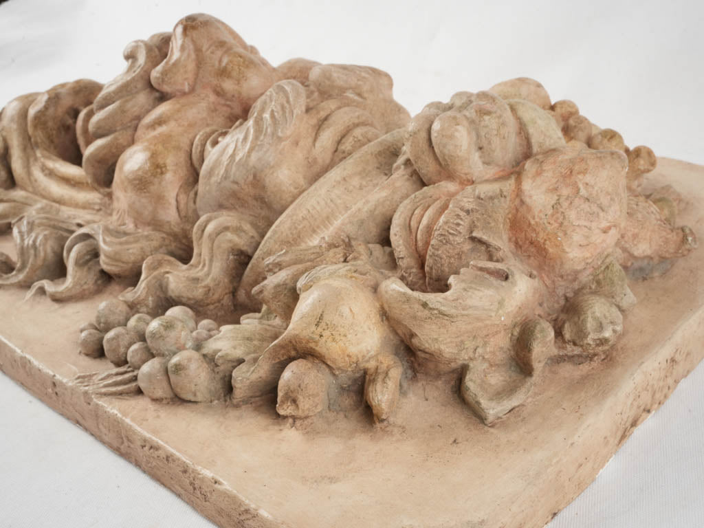 Wax-finished classic wall sculpture  