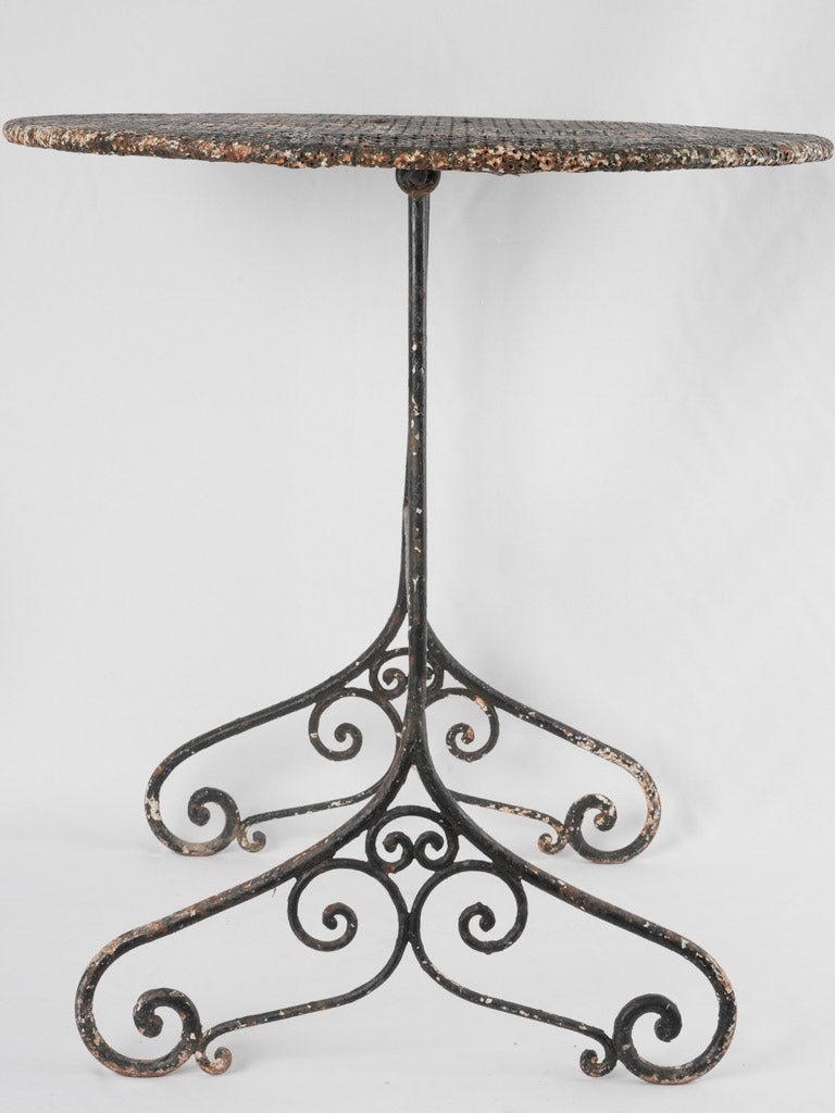 Antique French garden table with pierced clover-shaped design