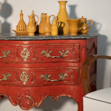 Red-gold French two-drawer sauteuse commode