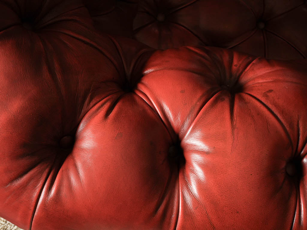 Traditional club-style Chesterfield couch  