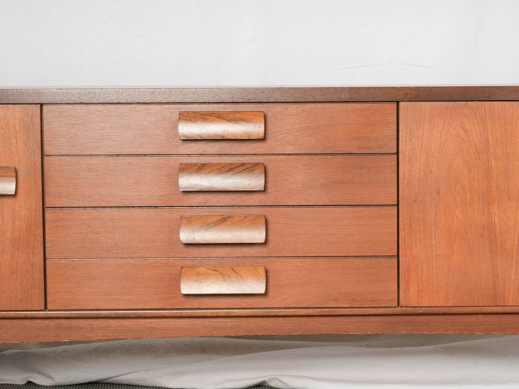 Sculpted pulls oak sideboard