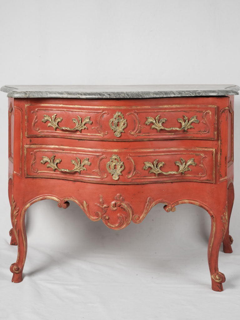 Red-gold Louis XV style walnut commode