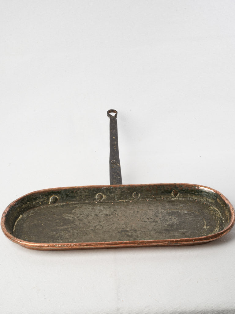 Elegant aged copper cookware piece  