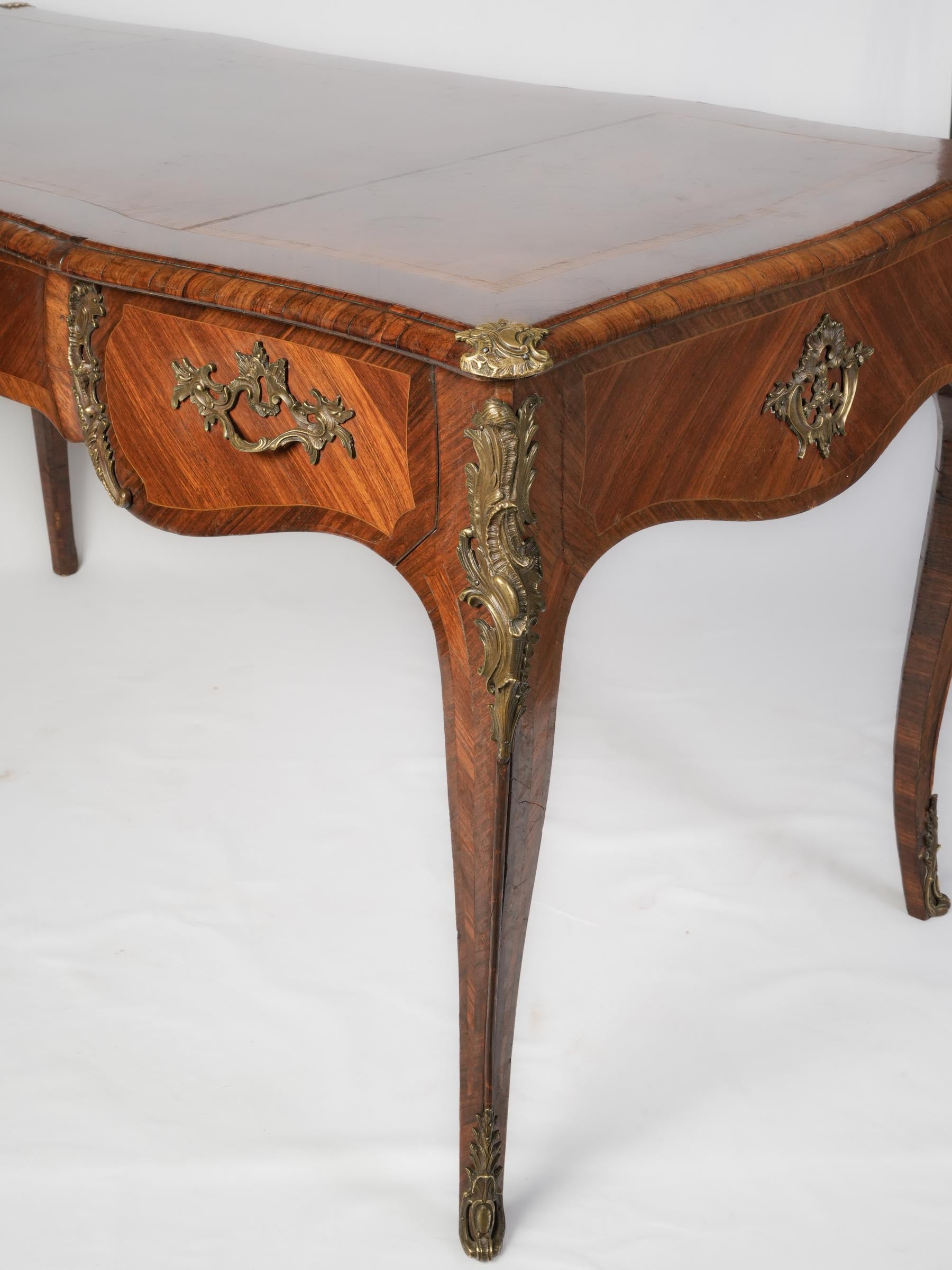 Richly veneered wooden desk  