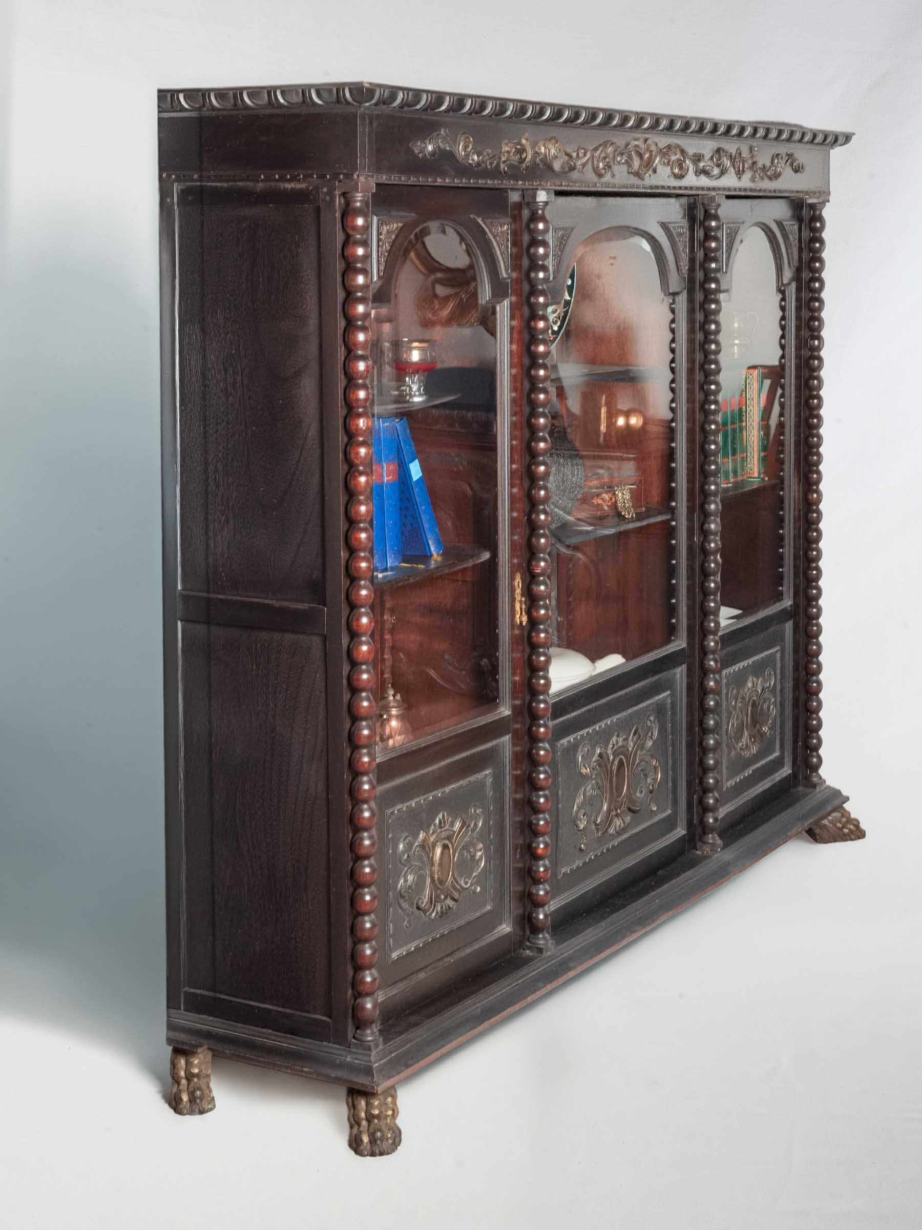 Striking ebonised wood bookcase