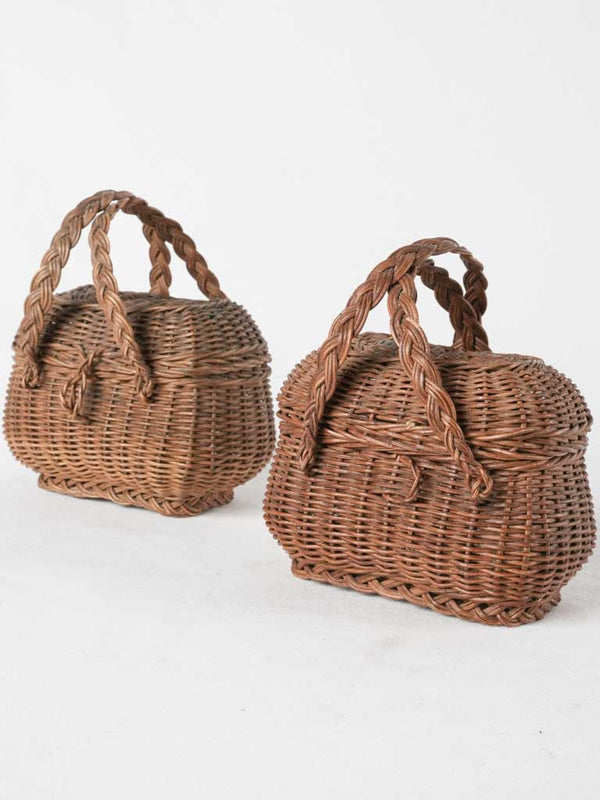 Antique wicker doll's basket pair
