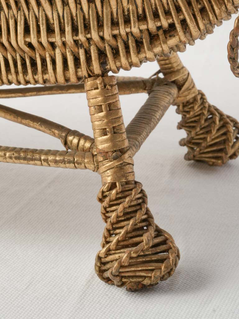 Artistic feather-adorned cradle