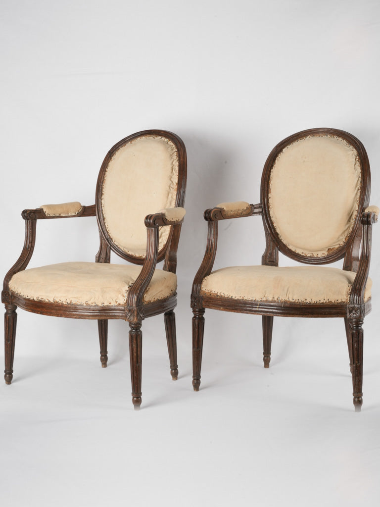Antique upholstered French cabriolet chairs