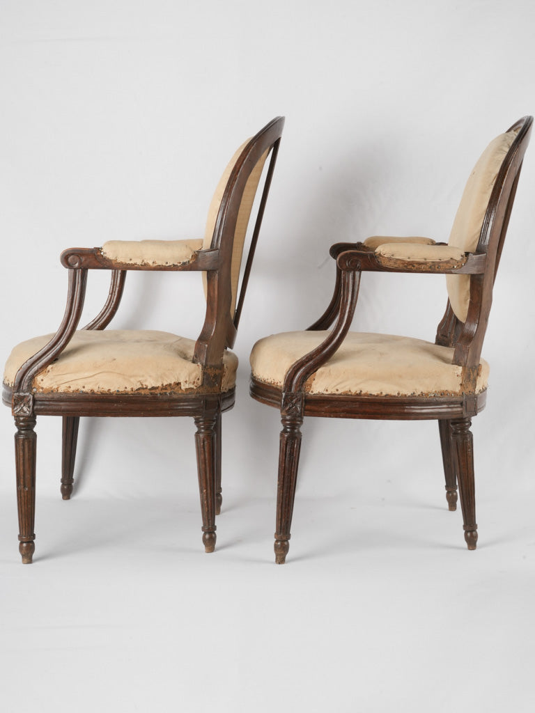Supportive medallion-back vintage French chairs