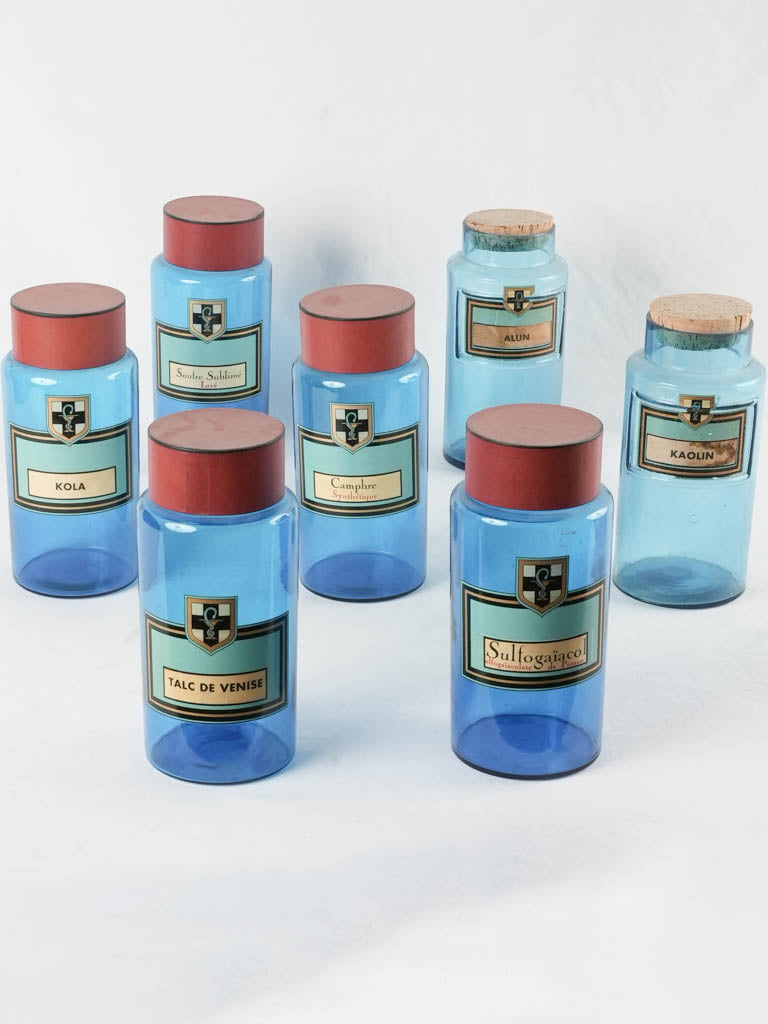Collection of 7 blue glass French apothecary jars 9½"