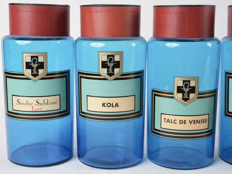 Collection of 7 blue glass French apothecary jars 9½"