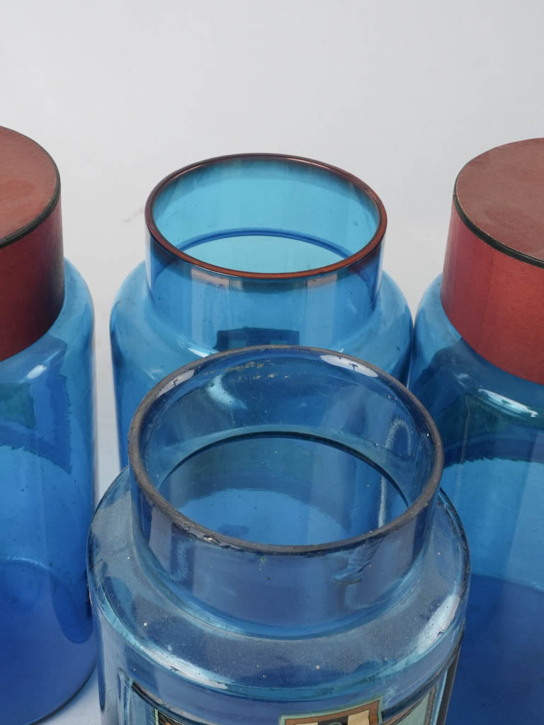 Collection of 7 blue glass French apothecary jars 9½"