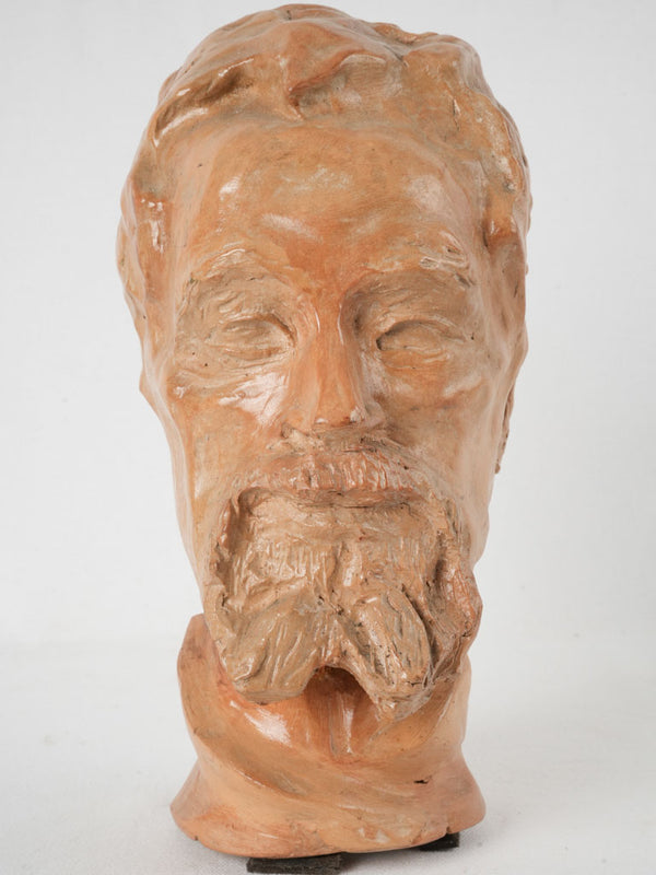Weathered bearded man sculpture