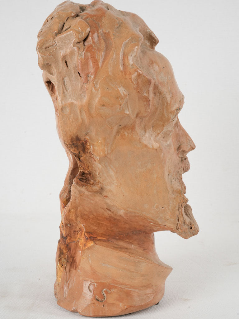 Worn terracotta 1950s bust sculpture