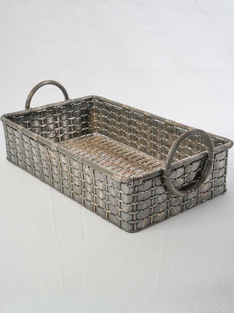 Chic mid-century silvered metal basket.