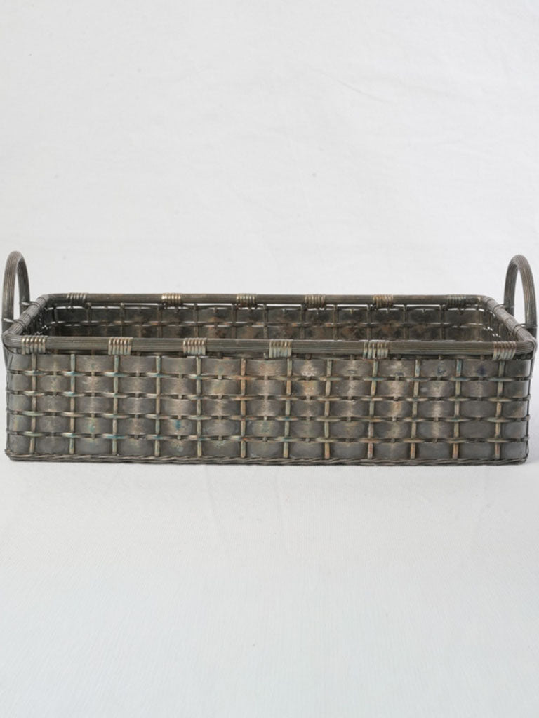 Handcrafted tight weave metal basket.