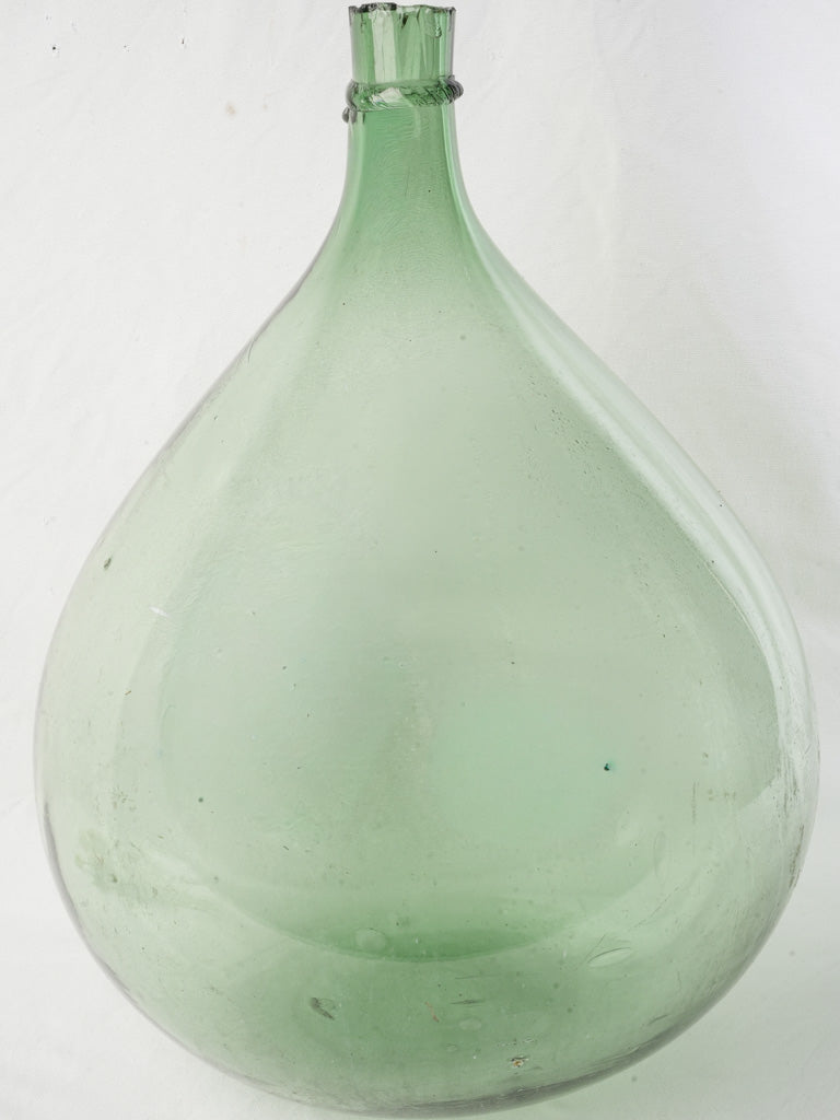 Hand-blown green glass bottle  