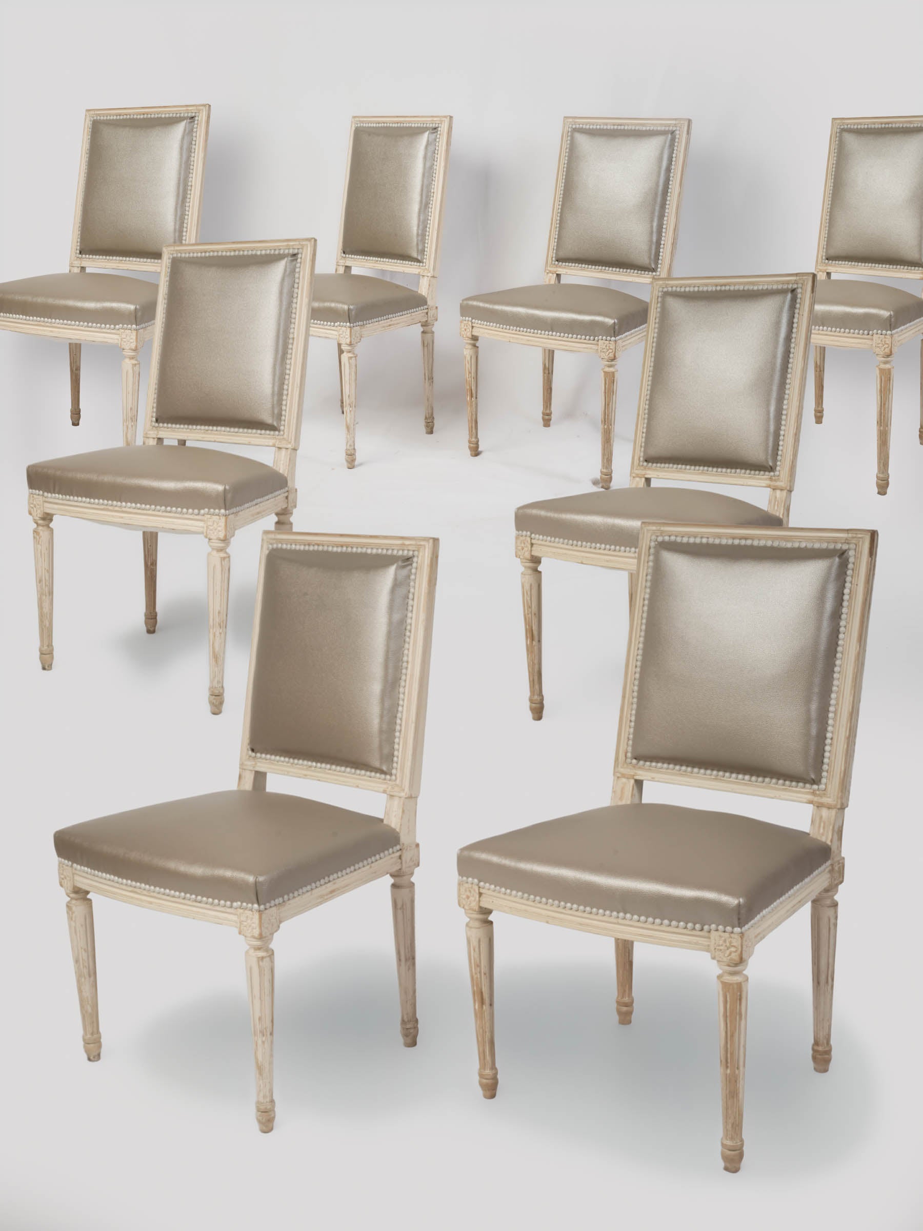 Suite of Eight French Louis XVI-Style Painted Dining Chairs, Early 20th Century