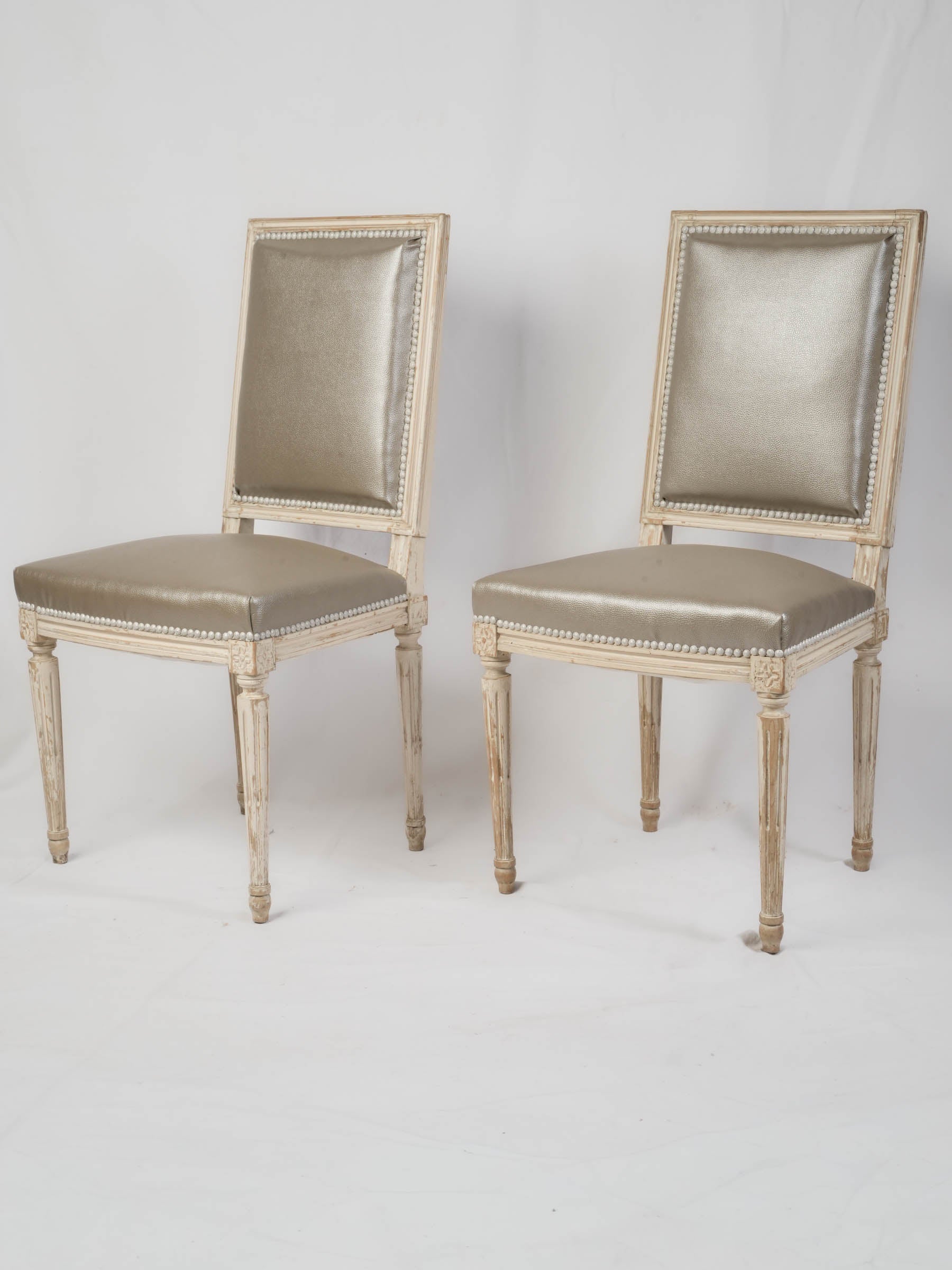 Suite of Eight French Louis XVI-Style Painted Dining Chairs, Early 20th Century
