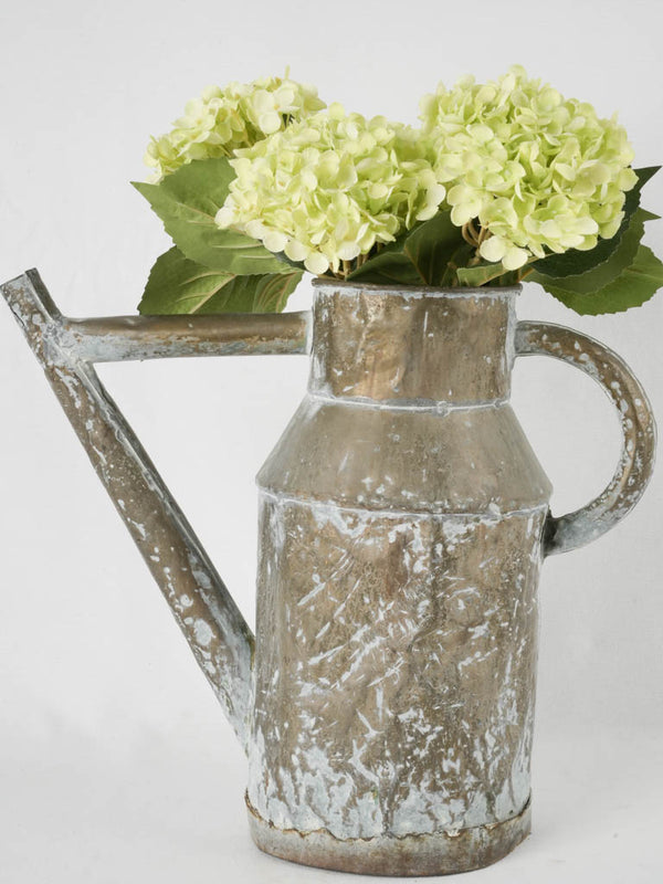 Antique weathered French watering can