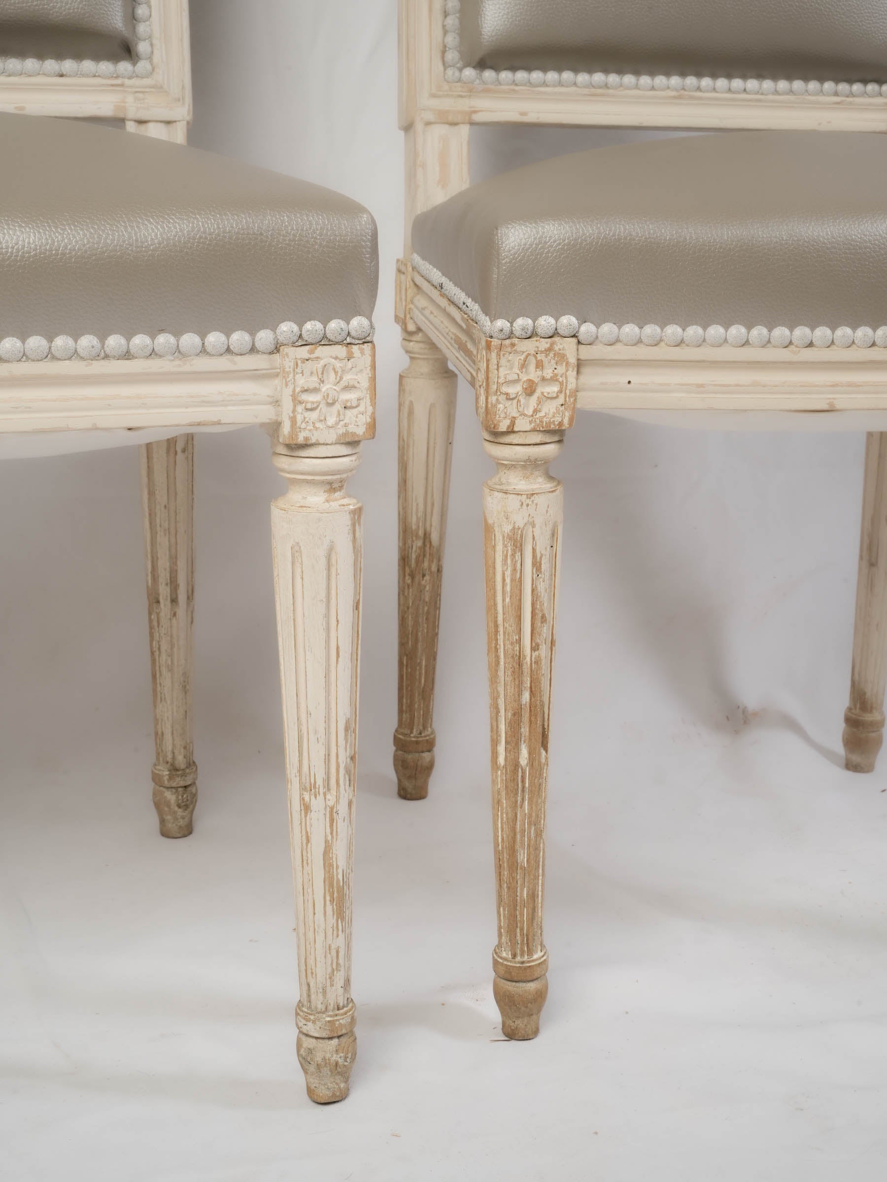 Suite of Eight French Louis XVI-Style Painted Dining Chairs, Early 20th Century