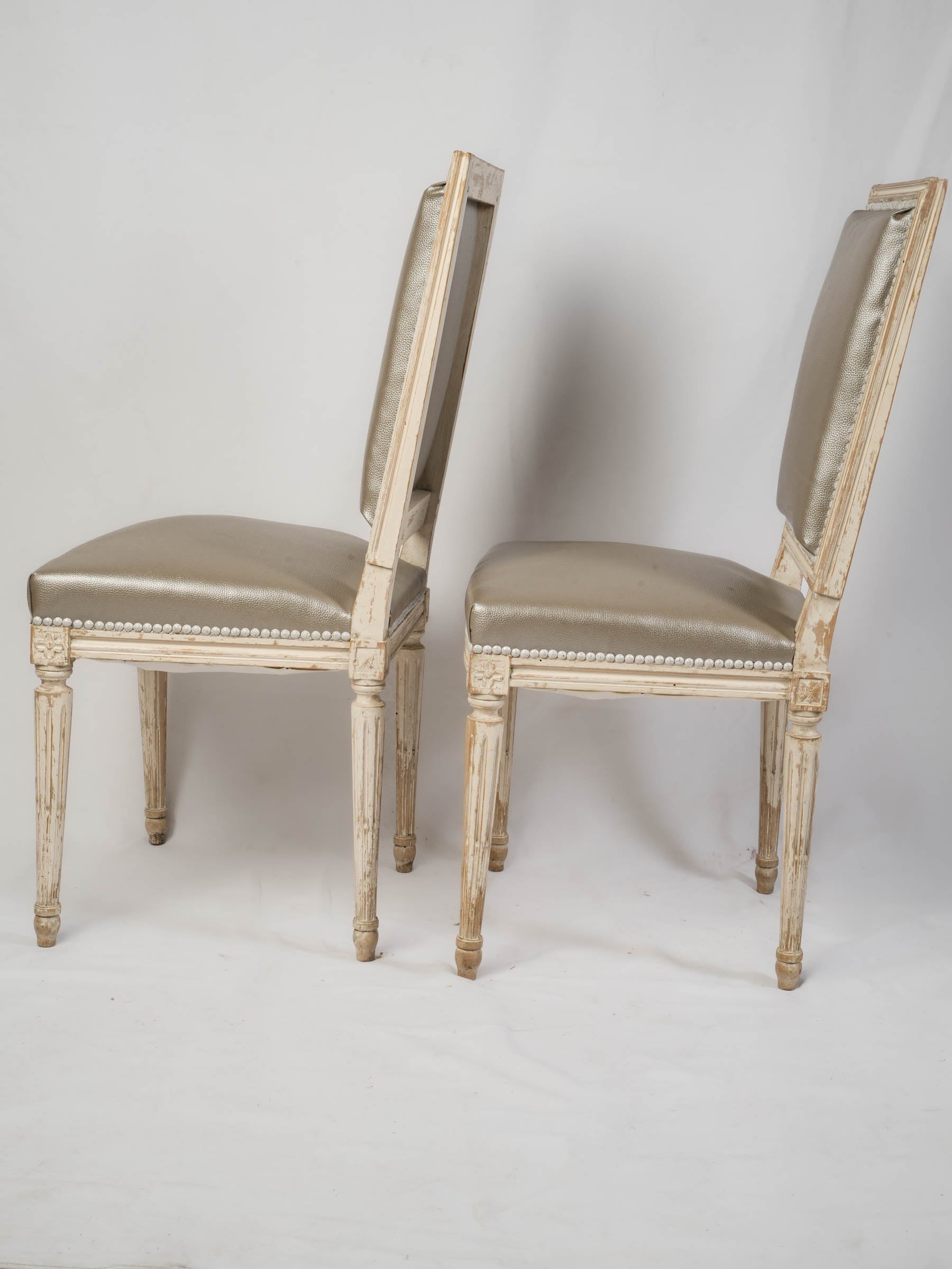 Suite of Eight French Louis XVI-Style Painted Dining Chairs, Early 20th Century